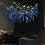 lustre contemporain élégant gouttes cristal bleu doré opalescent led salon chambre