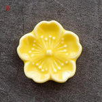 support bâtonnets encens fleurs stylisées artisanal rose bleu vert jaune blanc