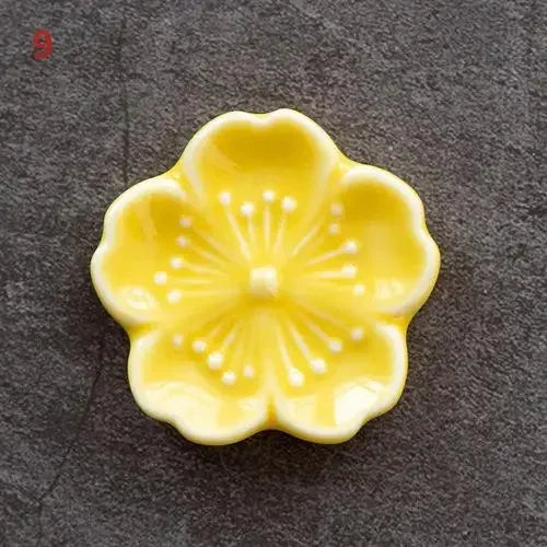 support bâtonnets encens fleurs stylisées artisanal rose bleu vert jaune blanc