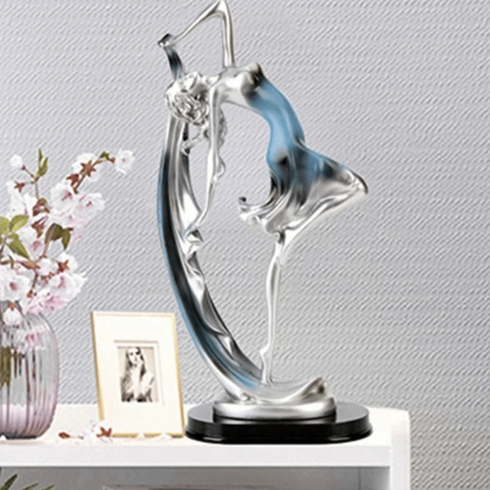 statue moderne femme mouvement argenté doré bleu lisse brillante base noire abstraite