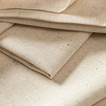 serviettes tissu texturé beige crème assiettes décorations table fêtes mariageextérieur