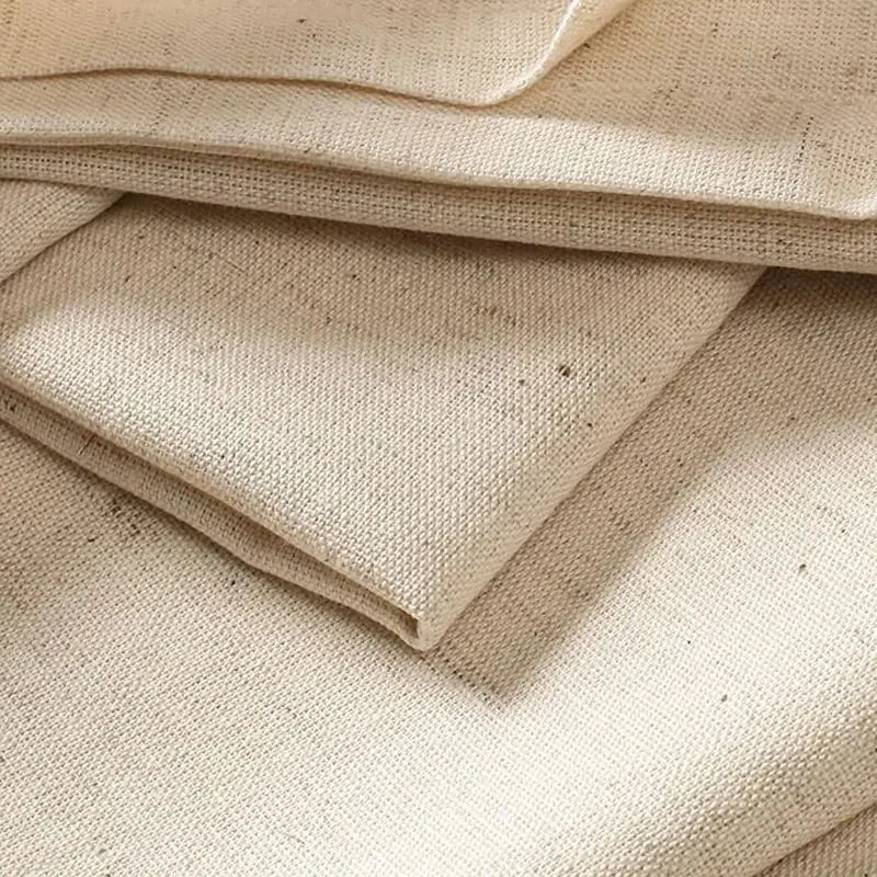 serviettes tissu texturé beige crème assiettes décorations table fêtes mariageextérieur
