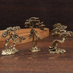 décoration intérieure sculpture arbre moderne feuilles stylisées cuivre doré artisanal base sculptée
