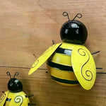 décoration extérieure abeille artisanale jaune noire rayures patio jardin pendaison métal fleuri
