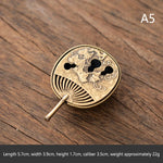 brûleur d'encens bronze doré motif floral oriental cendrier spatule métal