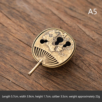 brûleur d'encens bronze doré motif floral oriental cendrier spatule métal