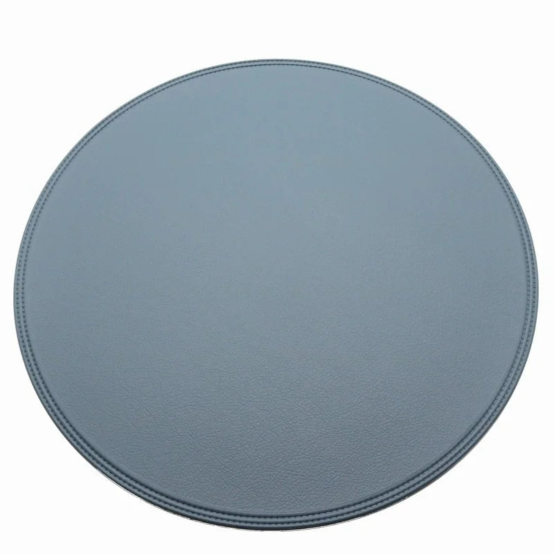 tapis table ronds bleu simili cuir élégants respectueux environnement assortis vaisselle décoration moderne