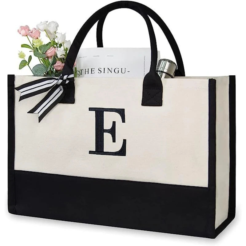 sac main toile lettre imprimée blanc noir rubans classique poignées intérieur noir zippé capacitaire