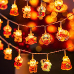 guirlande lumineuse chinoise festive lions poissons lanternes caractères rouges orange doré