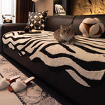 housse canapé molleton jacquard rayures horizontales noir blanc moderne salon intérieur