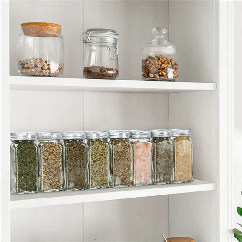 organisateur épices bocaux verre étiquettes couvercle bois assortiment herbes sel transparents