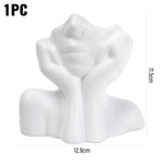 support pinceaux maquillage or argent noir visage stylisé moderne sculpturaliaux pinceaux