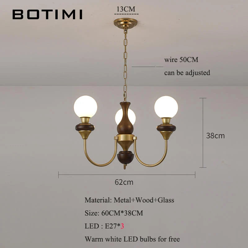lustres modernes chandelier or marron foncé ampoules led globes opaques éléments décoratifs