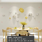 décoration murale moderne boules argent dorées fixations set intérieur