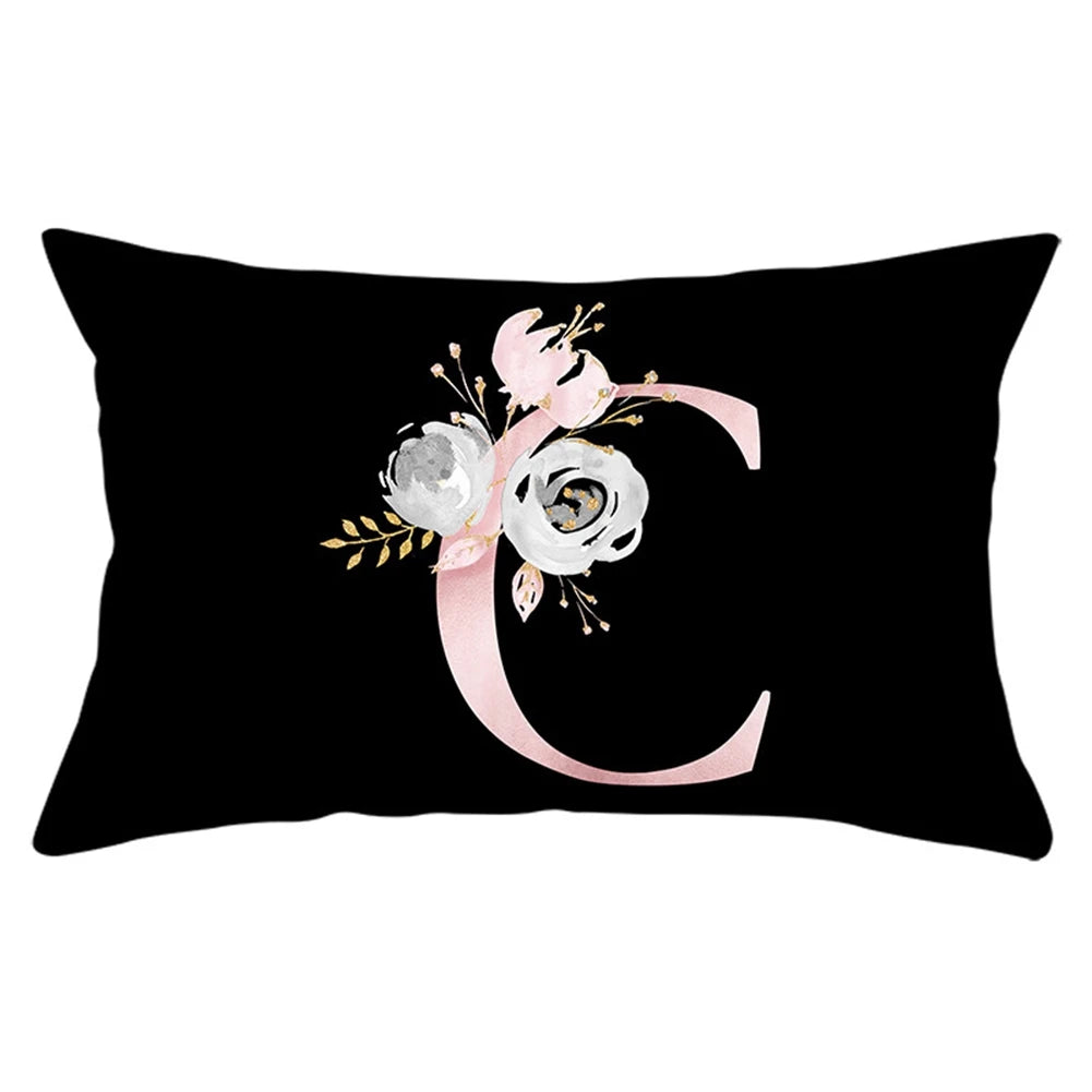coussin rectangulaire noir fleurs blanches lettres roses décoration canapé salon moderne peluche douce maison