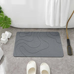 tapis bain absorbant rapide diatomée pierre antidérapant moderne gris ondulé