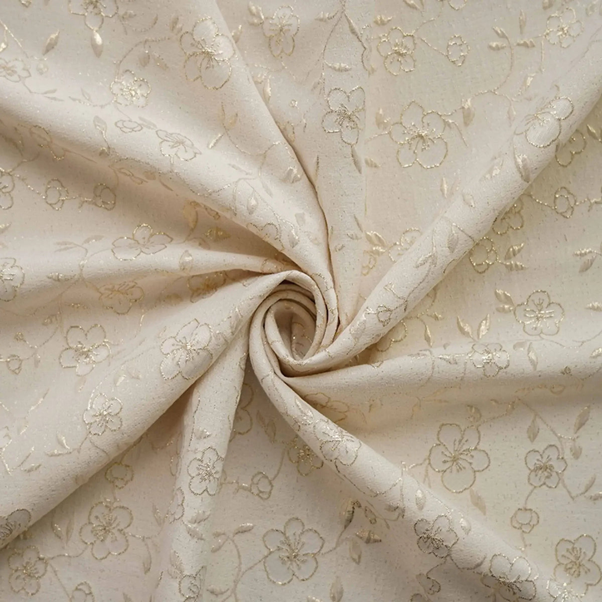 tissu brodé fleurs blanches feuilles dorées beige clair vert pastel rose pâle opacité polyester