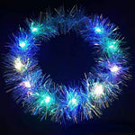 couronne lumineuse festive tissus brillants couleurs vives bleu rose violet lumineux tinsel opaque festive