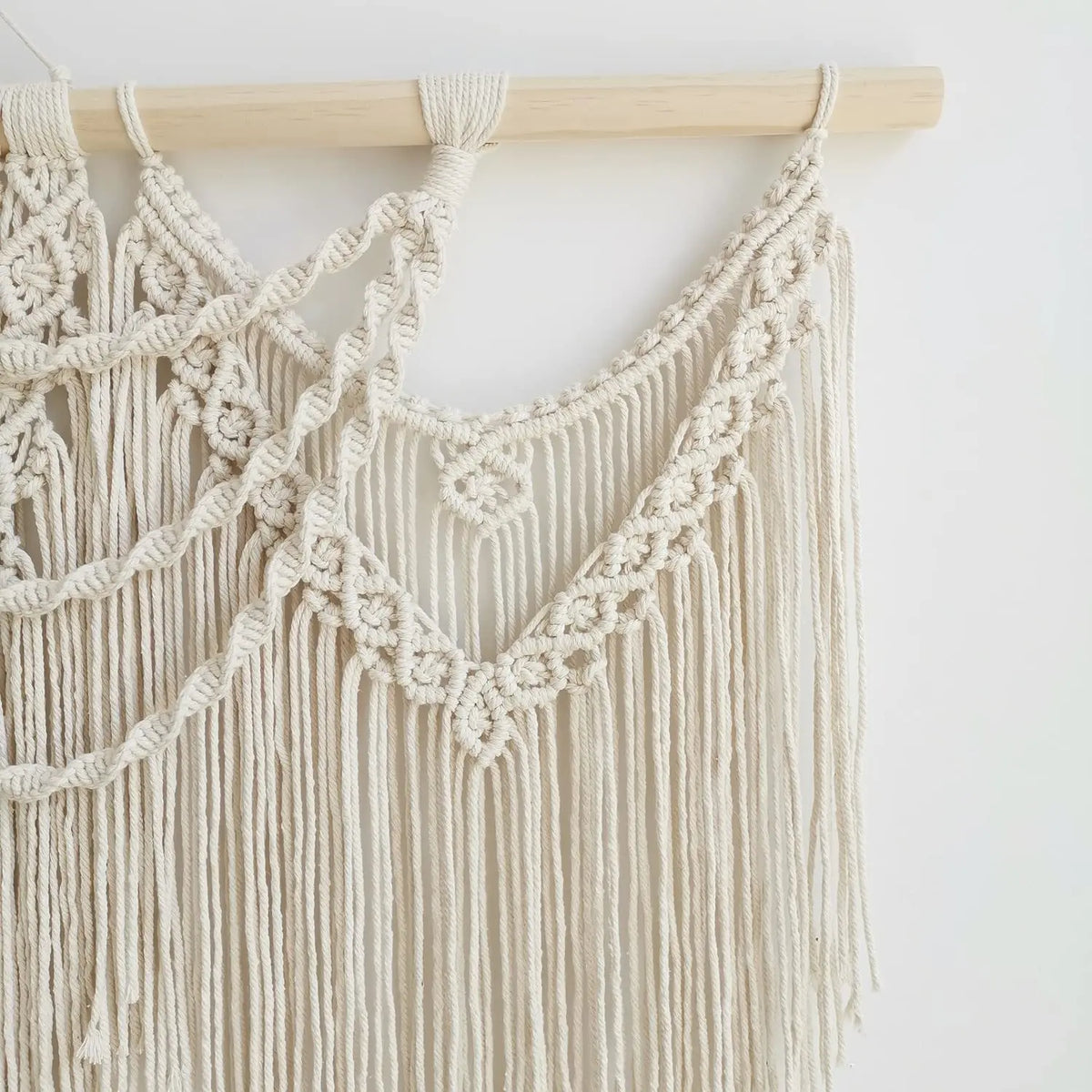 tapisserie macramé bohème franges géométriques beige clair mur décoration artisanal coton lavage main