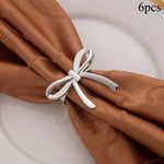 porte serviettes forme noeud papillon or argent rose doré texturé élégants festifs set six