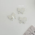 clips décoratifs nœuds blanc rose clair rose foncé modernes brillants sans perçage