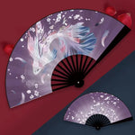 éventail traditionnel artisanal peinture artistique motifs floraux ruban décoratif couleurs vives