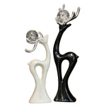 statues cerfs noir blanc sphères verre argentées décoration moderne salon meuble tv armoire vin