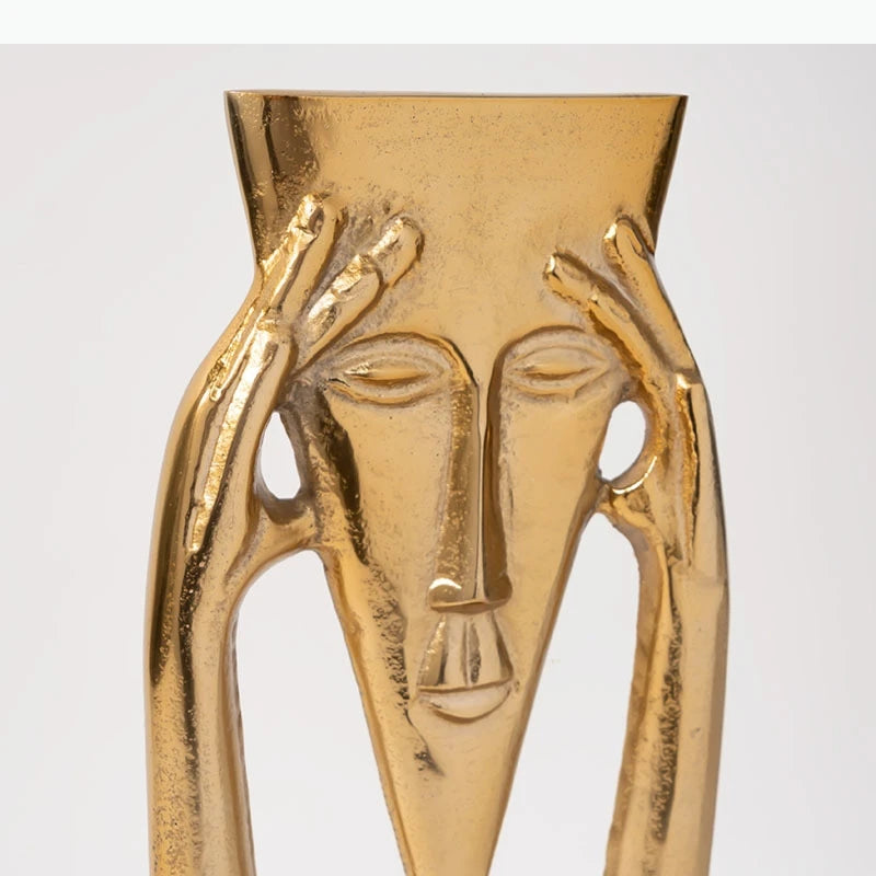 Sculpture dorée abstraite visage humain art africain vase fleurs séchées tableau texture rugueuse