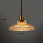lampe suspendue vert moderne ampoule chaîne métallique rayures verticales salon chambre hall