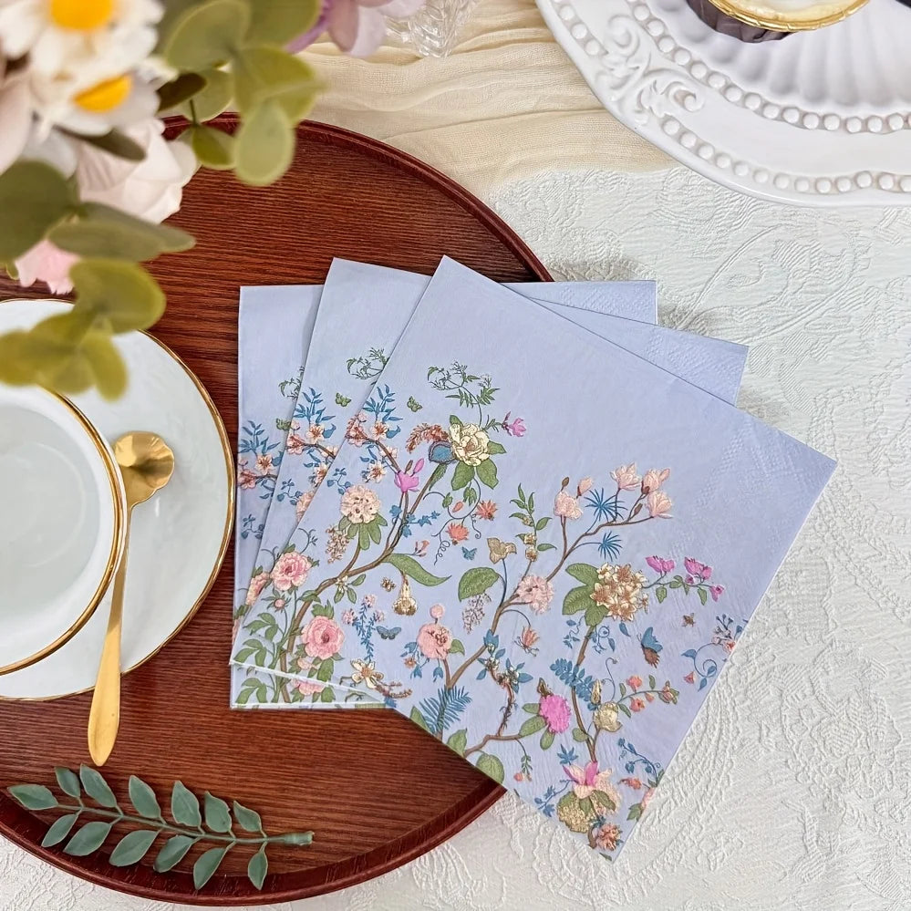 serviettes jetables fleur sauvage motif floral complexe decoration table elegante papier bleu gris rose