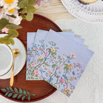 serviettes jetables fleur sauvage motif floral complexe decoration table elegante papier bleu gris rose