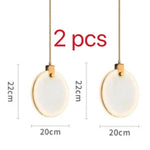 suspension lumineuse moderne marbre blanc gris doré clips métalliques câbles dorés salon chambre