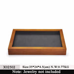 boîte rangement bijoux bois gris foncé classique motif géométrique opacité adhésif plaque cuir anniversaire