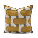 coussin décoratif nordique brodé motif géométrique beige moutarde orange brun boho chic