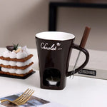 bouilloire chocolat céramique moderne cuillère bois bougie rouge noir blanc