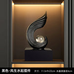 statuettes décoratives modernes or blanc noir spirale sphère transparente minimaliste sculptural