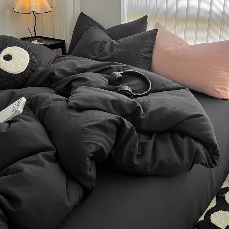 Taies d'oreiller assorties à la housse de couette noire
