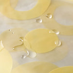 rideau douche moderne transparent cercles dorés métalliques blanc jaune clair salle bain decoration