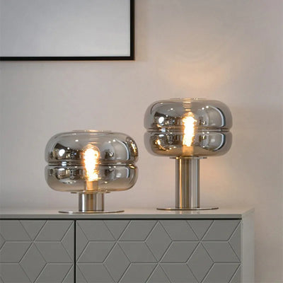 Lampe de chevet scandinave minimaliste en verre vert sur table de nuit