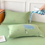 protège oreiller imperméable blanc gris bleu marine vert rose gouttes d'eau moderne