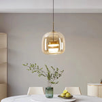 suspension lumineuse moderne transparente dorée câble noir alliage led dimmable certification rohs flux luminescent