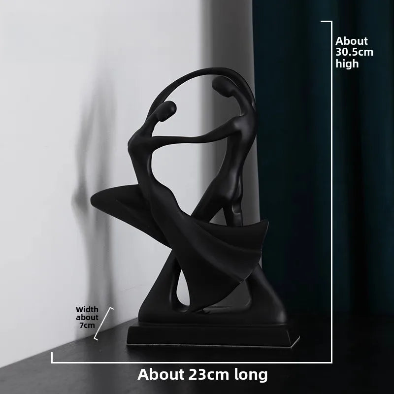 figurines humaines enlacées noir blanc sculpture résine moderne minimaliste