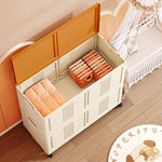 rangement mobile pliable rectangle moderne couleur beige vert orange lignes verticales roulettes tapis sol