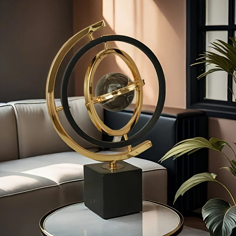 sphère artificielle moderne marbrée dorée noire décoration intérieure base carrée geometrique