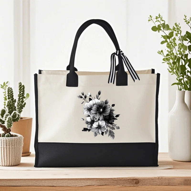 sac main toile fleurs noires fond beige moderne élégant poignées détachables zip intérieur respectueux