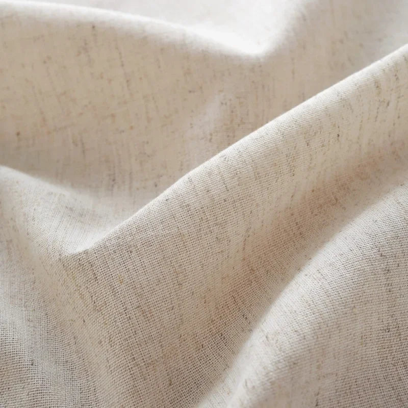 nappe réutilisable polyester texture lin beige table fête scandinave minimaliste rustique assiettes chaises