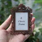 cadre photo pied bronze argenté vintage décor floral complexe métal ornementé