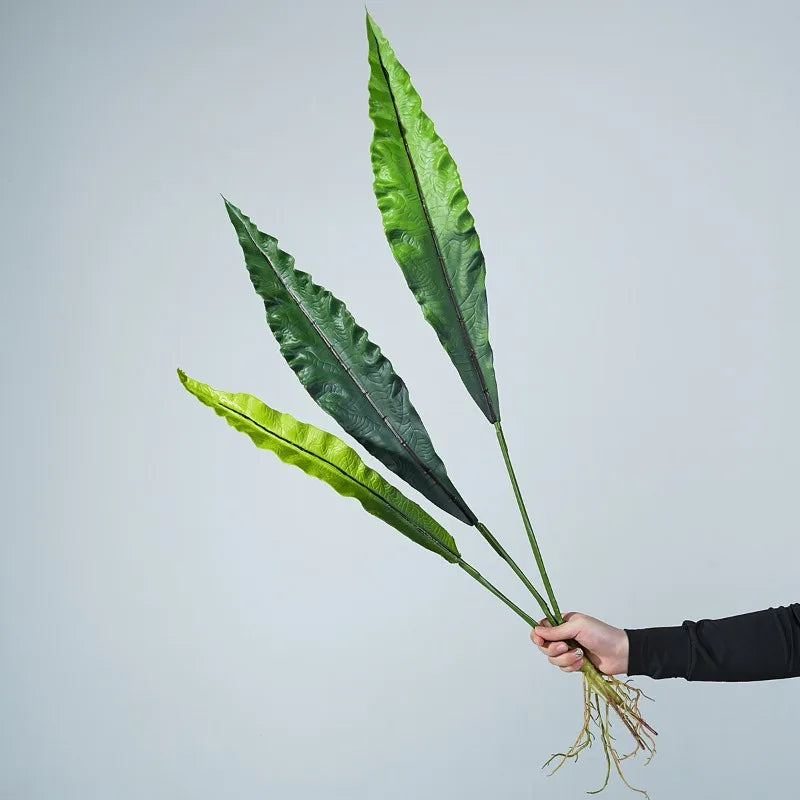 décoration intérieure plante artificielle feuilles vert larges moderne pot verre