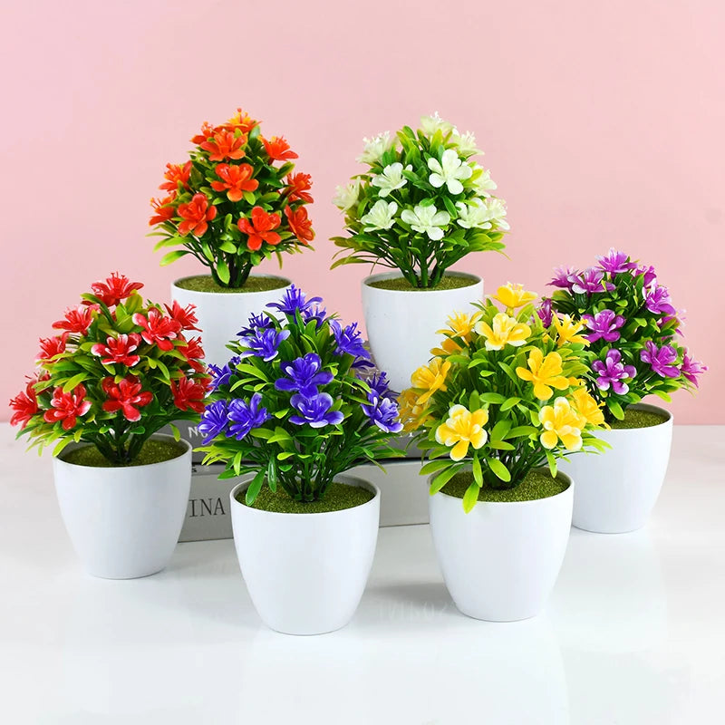 plantes artificielles fleurs rouges jaunes violettes blanches feuilles vertes pot blanc moderne décoration intérieure
