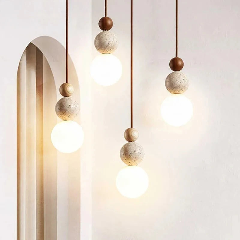 Suspension lumineuse moderne pierre gris beige brun clair texture granulée câble noir salon chambrehôtel